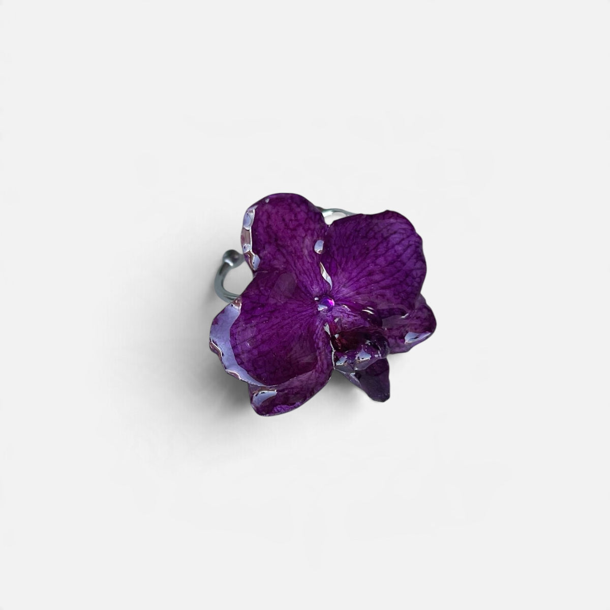 ANELLO IN ACCIAIO CON FIORE DI ORCHIDEA VERA