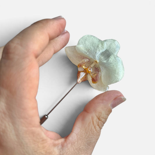 SPILLA IN ACCIAIO CON FIORE DI ORCHIDEA BIANCA VERA